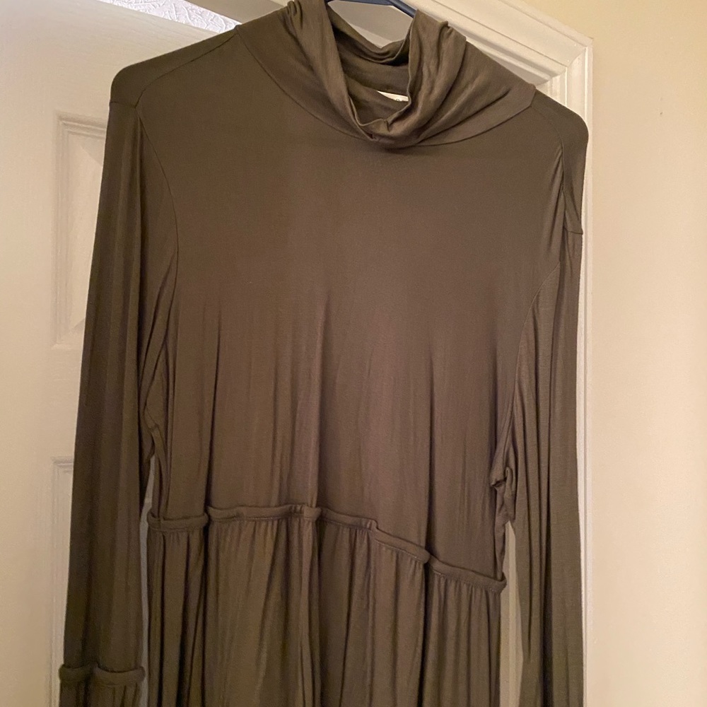 Olive green long sleeve baby doll shirt.